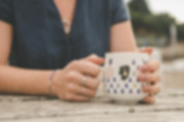 minimal gemstone jewellery.  Chalcedony, pearls, sterling silver stacking rings, bracelets and pendant necklace.  Taken by the seaside in Falmouth, Cornwall.